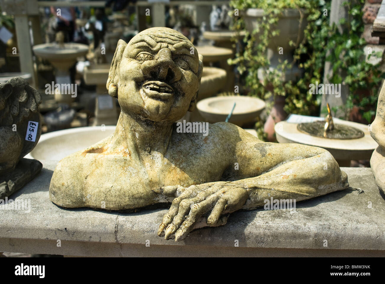 Grotesque garden ornamental bust for sale Stock Photo