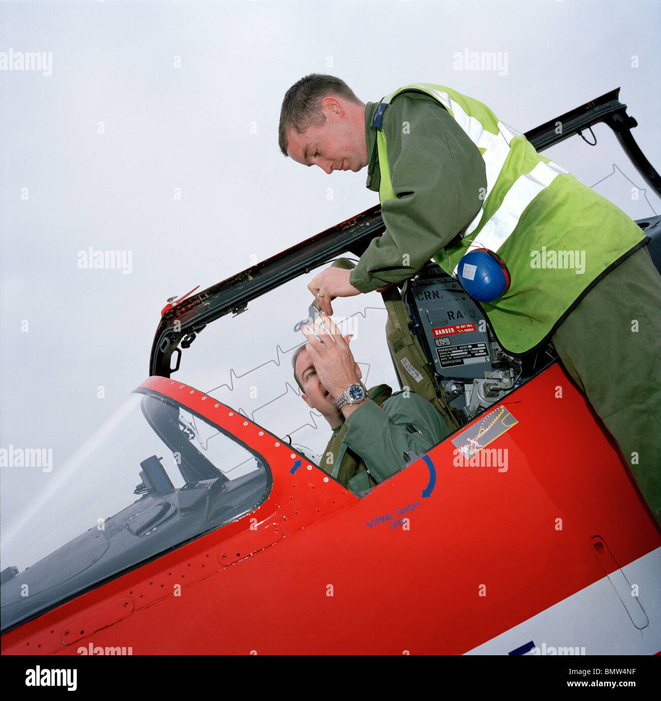 Members of the 'Red Arrows', Britain's Royal Air Force aerobatic team, prepare for next flight in Cyprus. Stock Photo