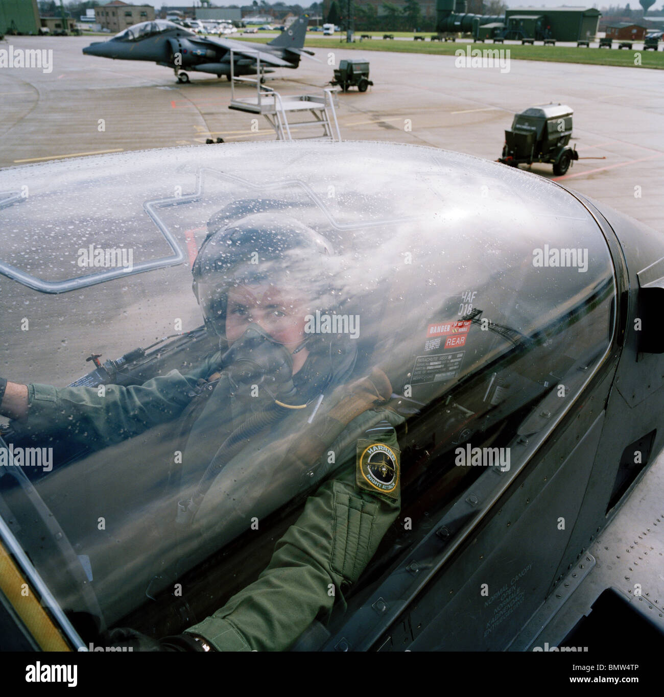 RAF fighter pilot in Harrier ground attack aircraft at RAF Wittering. Stock Photo