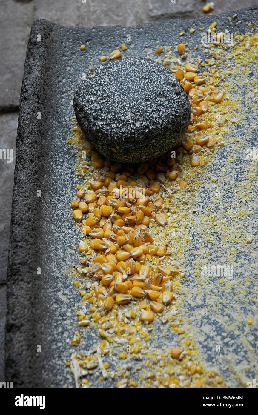 Native American corn grinding by hand display at the Heard Museum of