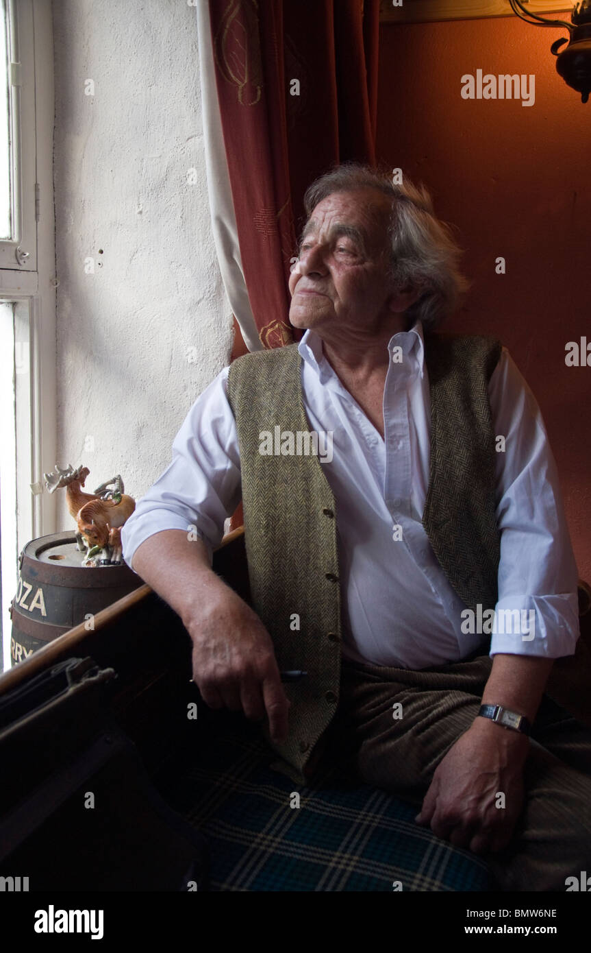 Paul Chatenoud author of 'The Eye of the Ventriloquist' relaxes before signing his book at Nancy's Bar in Ardara Stock Photo