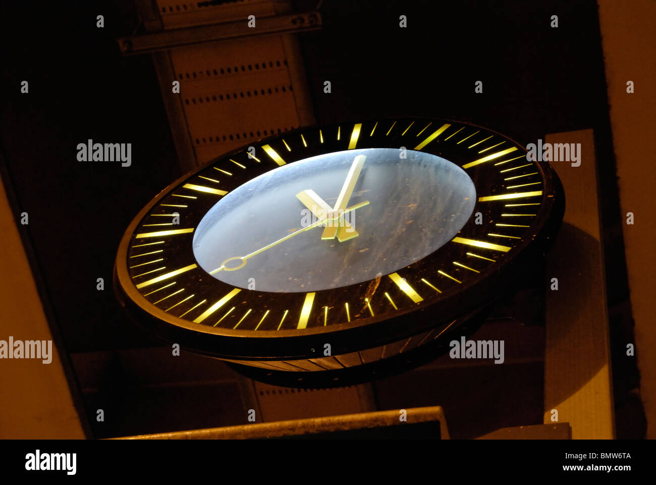 Railway station clock at night. Cannes. Cote d'Azur. France. Time