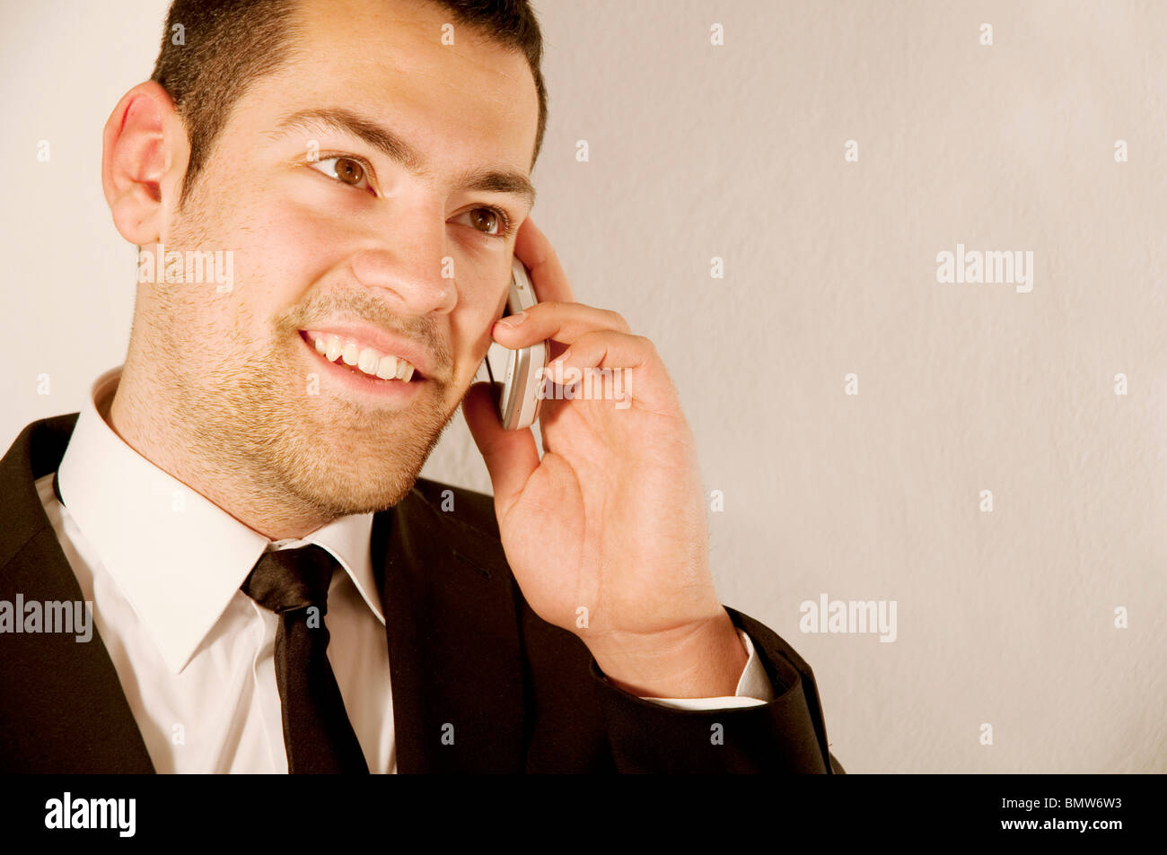Young man using mobile phone. Close view. Stock Photo