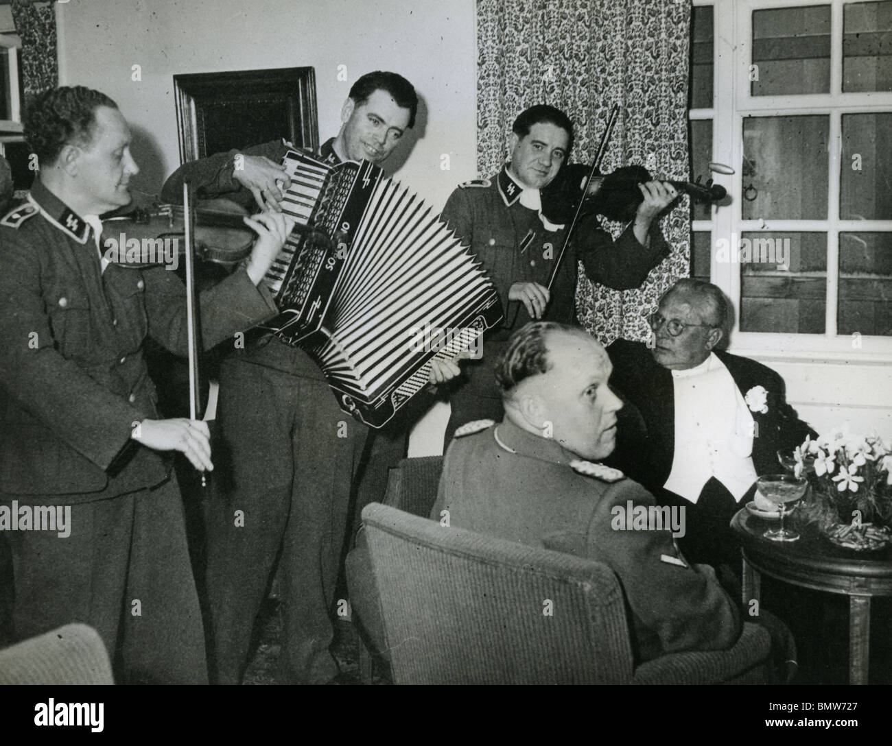 EVA BRAUN's father Friedrich is serenaded at Hitler's Berghof ihome in 1945 Stock Photo