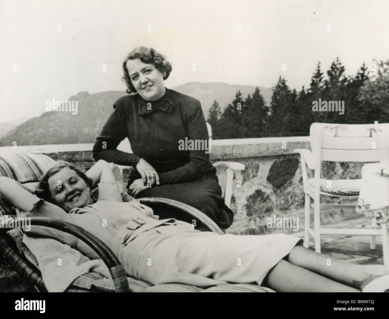 EVA BRAUN relaxing at Hitler's  Berghof with ex-actress Hannelore  Morell wife of  Hitler's doctor Theodore Morell Stock Photo