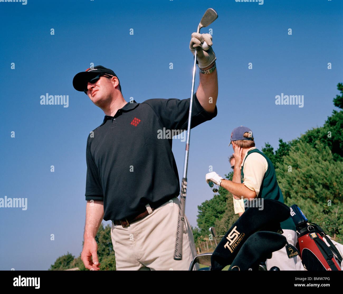 Squadron Leader Dave Thomas of the 'Red Arrows', Britain's Royal Air Force aerobatic team plays golf while off-duty in Jersey Stock Photo