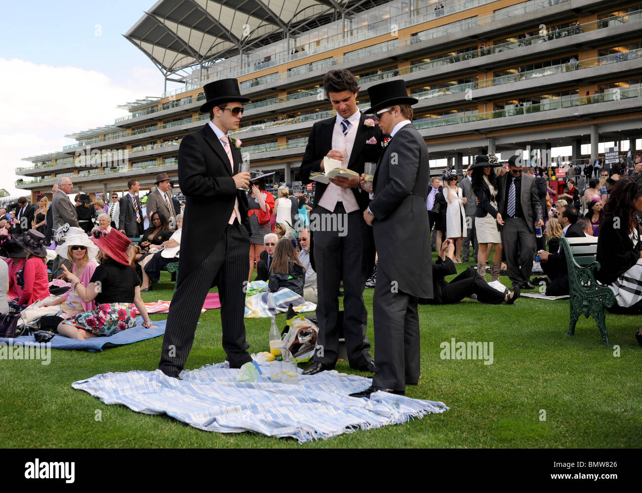 Royal Ascot Horse Racing male Racegoers wearing Morning Suits in front of the Grandstand Berkshire UK Stock Photo