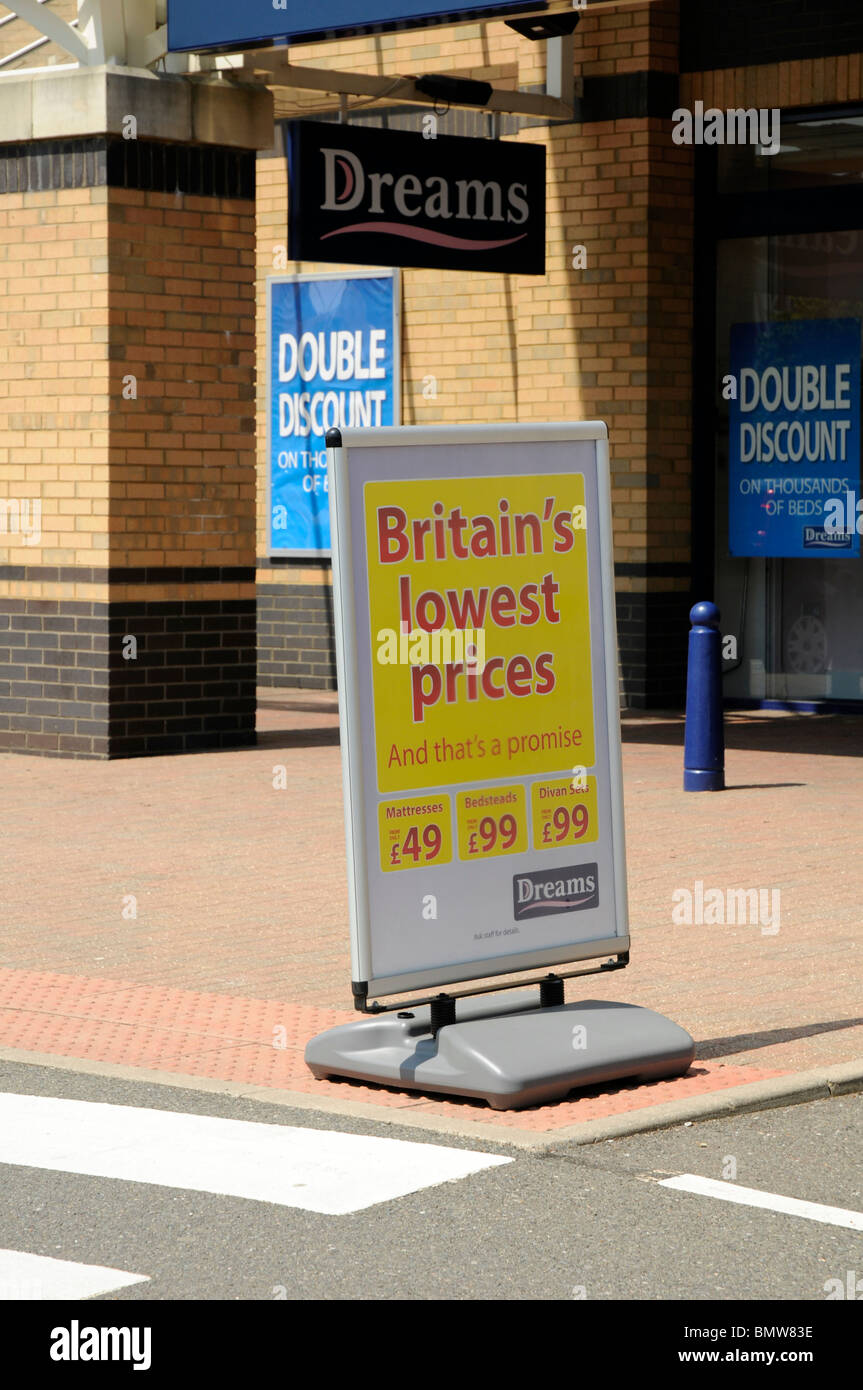 Dreams bed store, lowest prices sign, Retail Park, Peterborough Stock