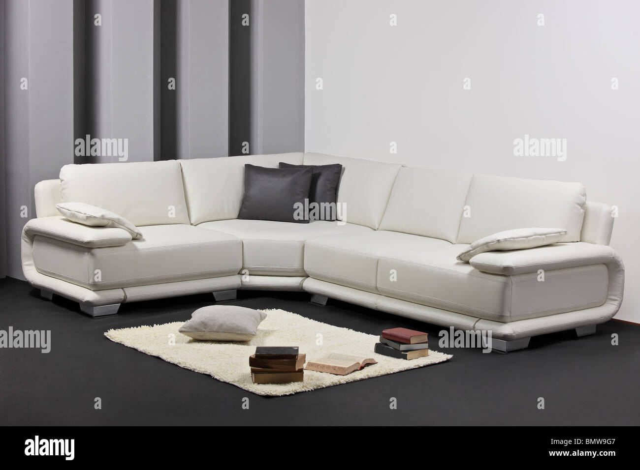 A living room with a white leather sofa Stock Photo Alamy