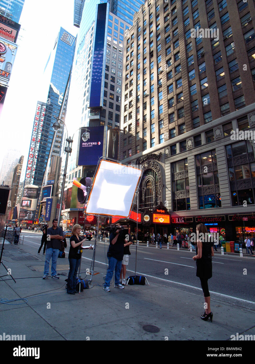A TV Presenter in New Yorks Times Square Stock Photo