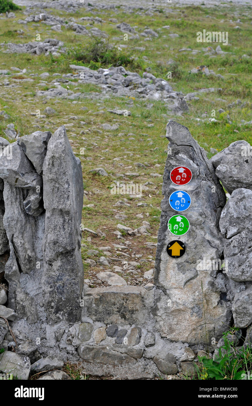 Routemarkers for long distance footpath. The Burren, County Clare, Ireland Stock Photo