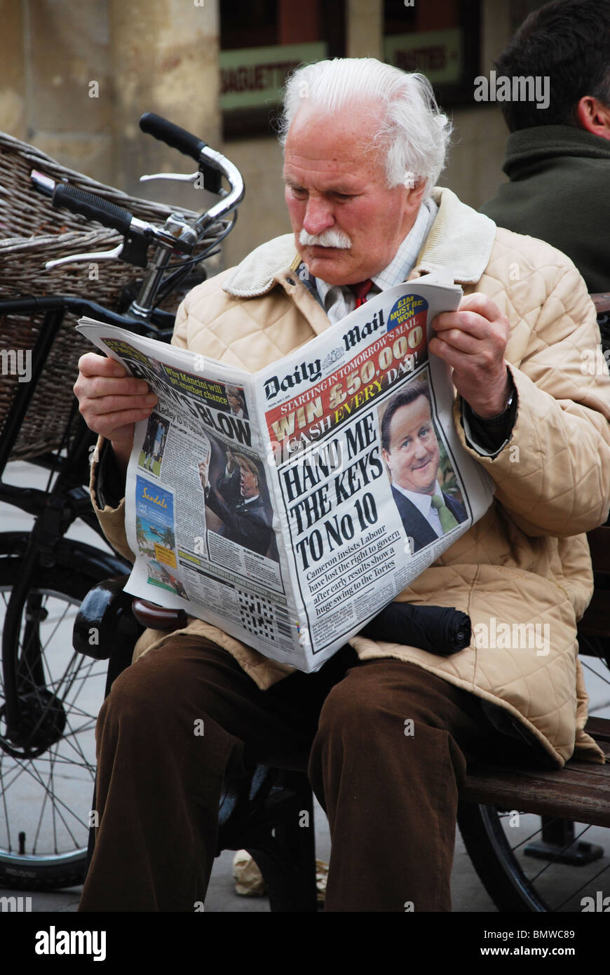 man reading Daily Mail newspaper Bath UK Stock Photo Alamy