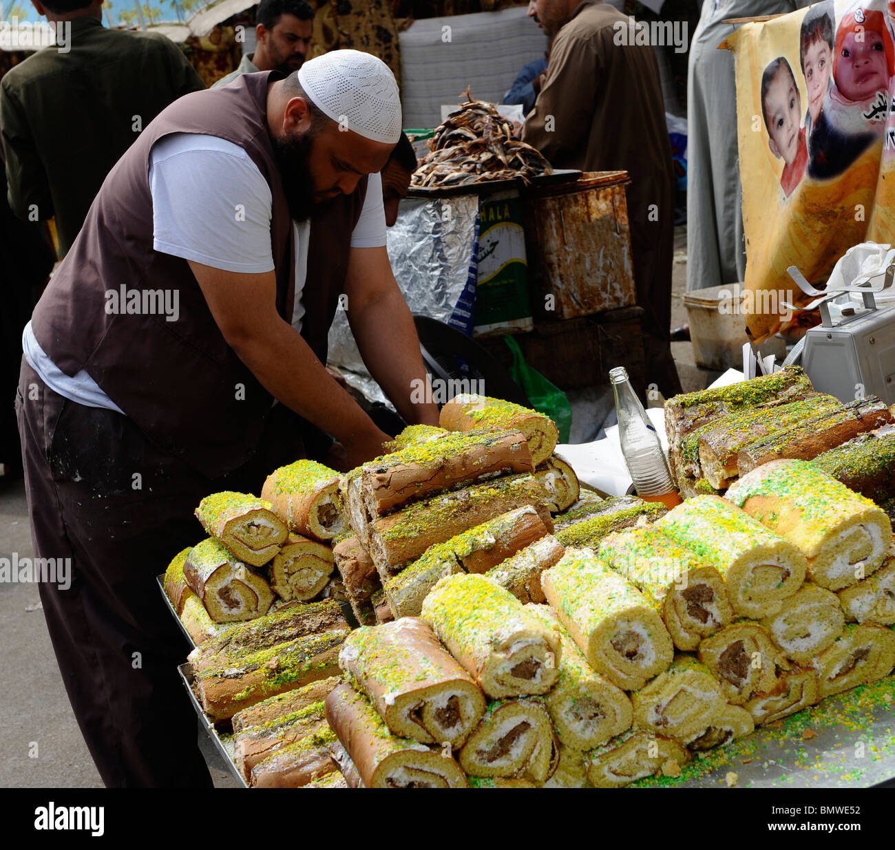 vendor selling cakes, souk goma (friday market), street market