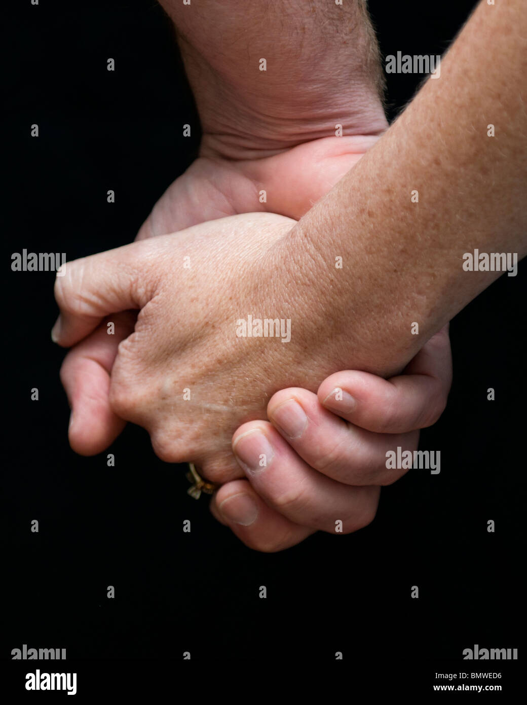 Fingers interlocked hires stock photography and images Alamy