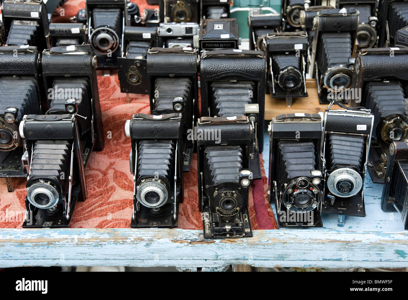 Vintage cameras on stall in Portobello Road market, London, England