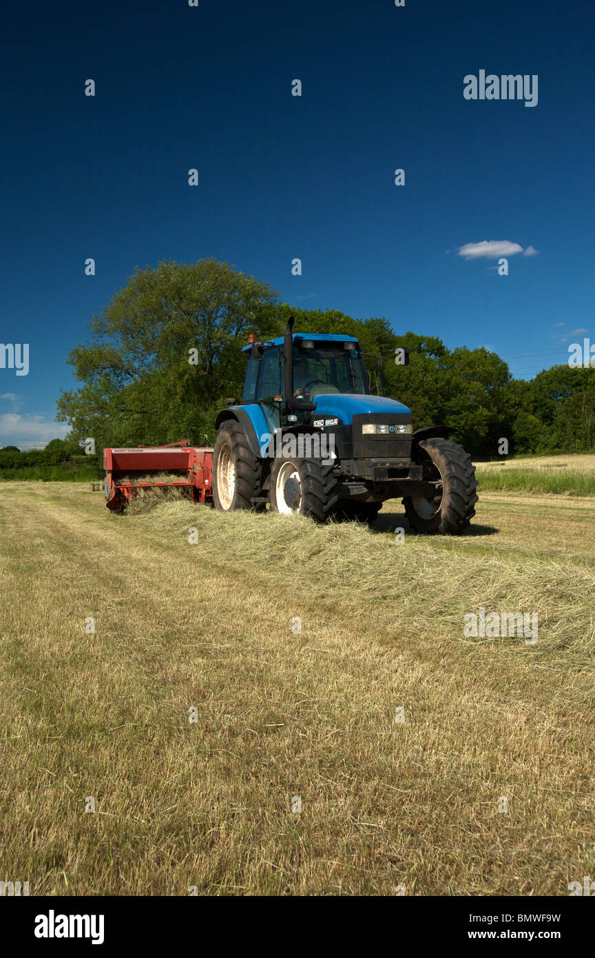 Tractor baling hay hires stock photography and images Alamy