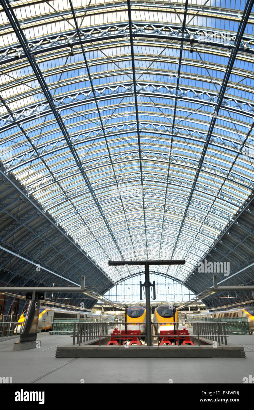 St Pancras International a Victorian railway Grade I listed station building & now a terminal with Eurostar trains under big single span glass roof UK Stock Photo
