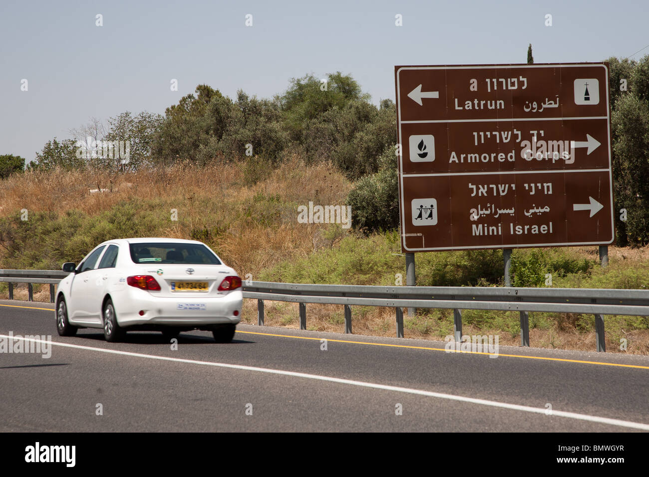Roadside direction sign on Road 3 Near Latrun Junction to Armored Corp Museum, Mini Israel and Latrun Monastery Stock Photo