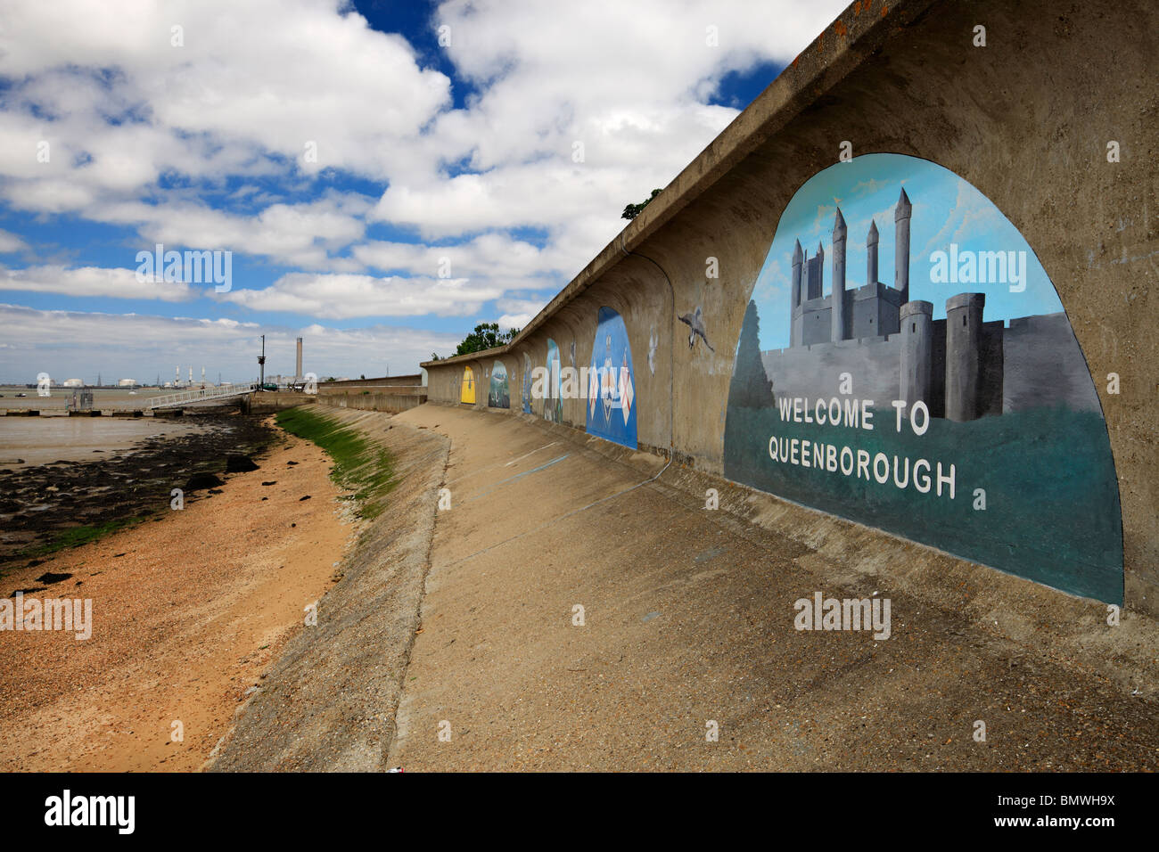 Welcome to Queenborough mural, painted on sea defences. Stock Photo