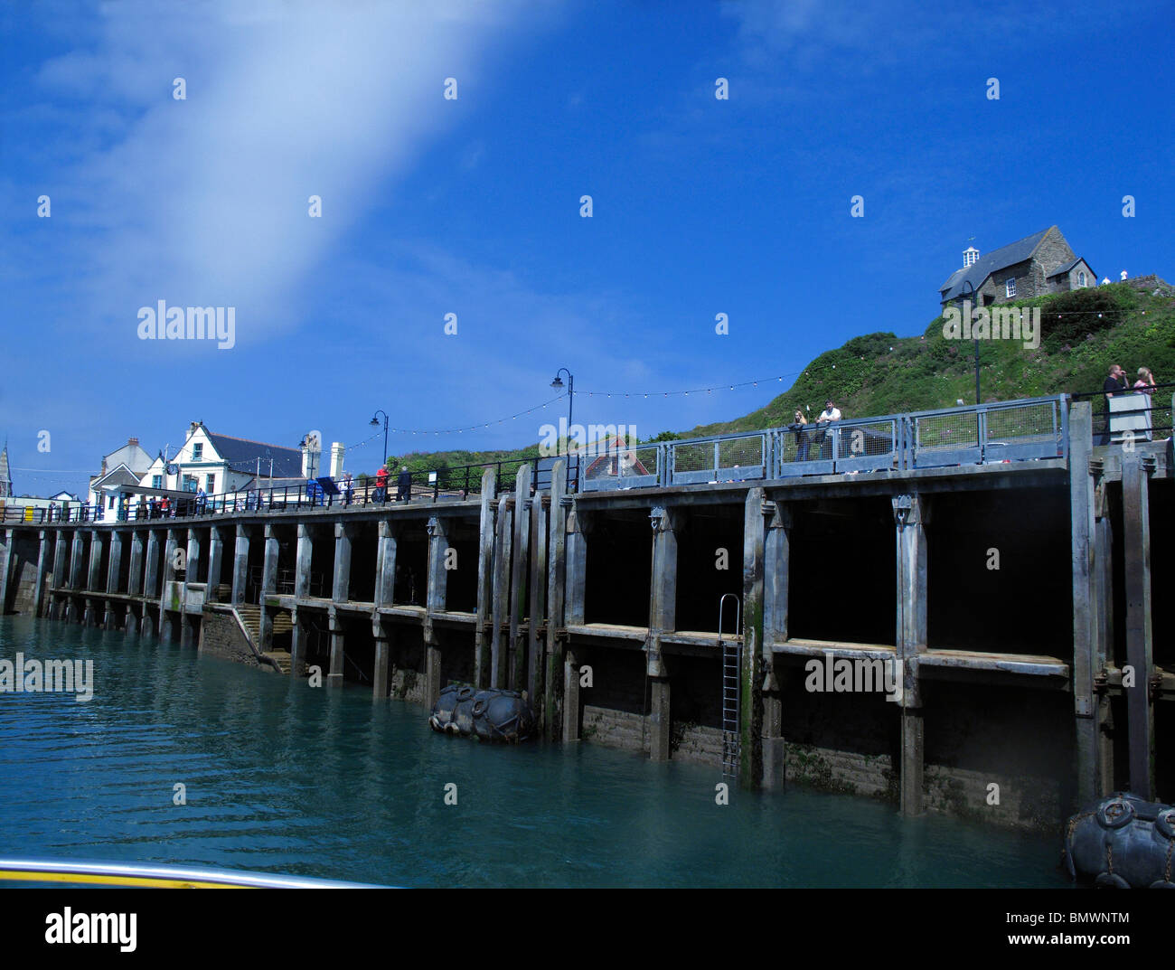 departing from the jetty at high tide, harbor, Devon Stock