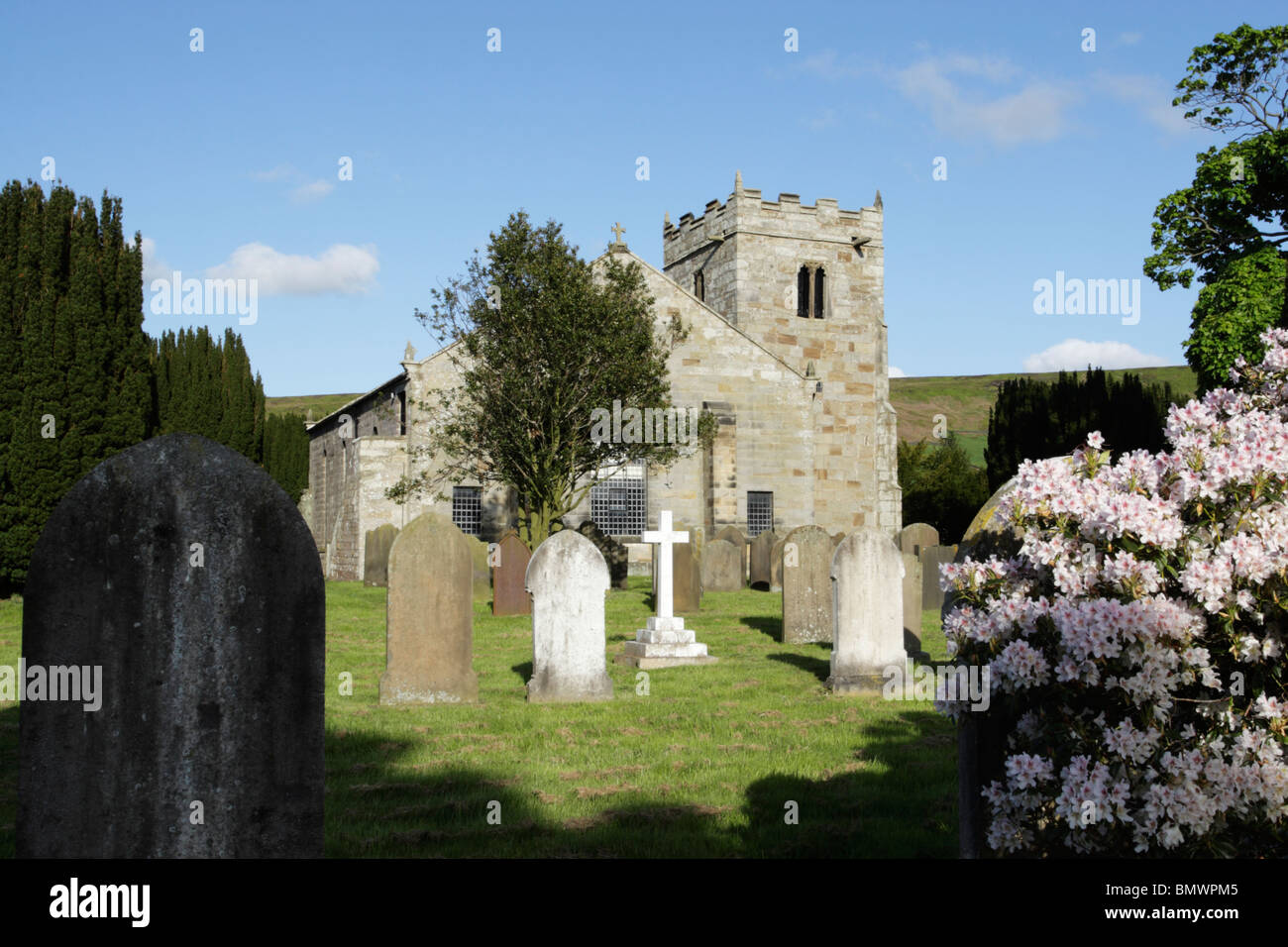 St. Hilda's church Danby Dale, the tower is 15th century with medieval windows in the tower but the rest is more recent rebuild Stock Photo