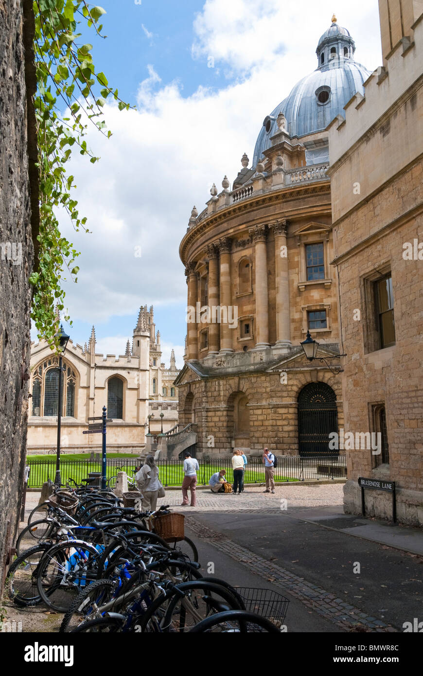 Bicycles parked in Brasenose Lane near the Radcliffee Camera and All Souls College Oxford Stock Photo