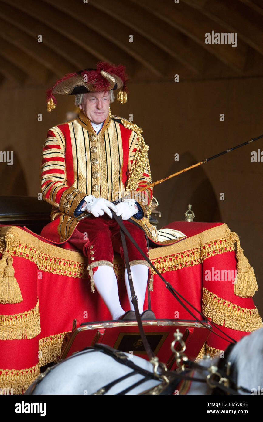 A carriage driver from the British royal household in ceremonial dress at the State Opening of Parliament Stock Photo