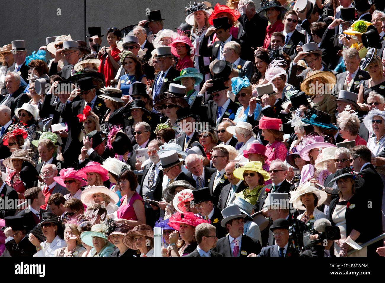 A crowd in the Royal Enclosure at the Royal Ascot horse race meeting in hats Stock Photo