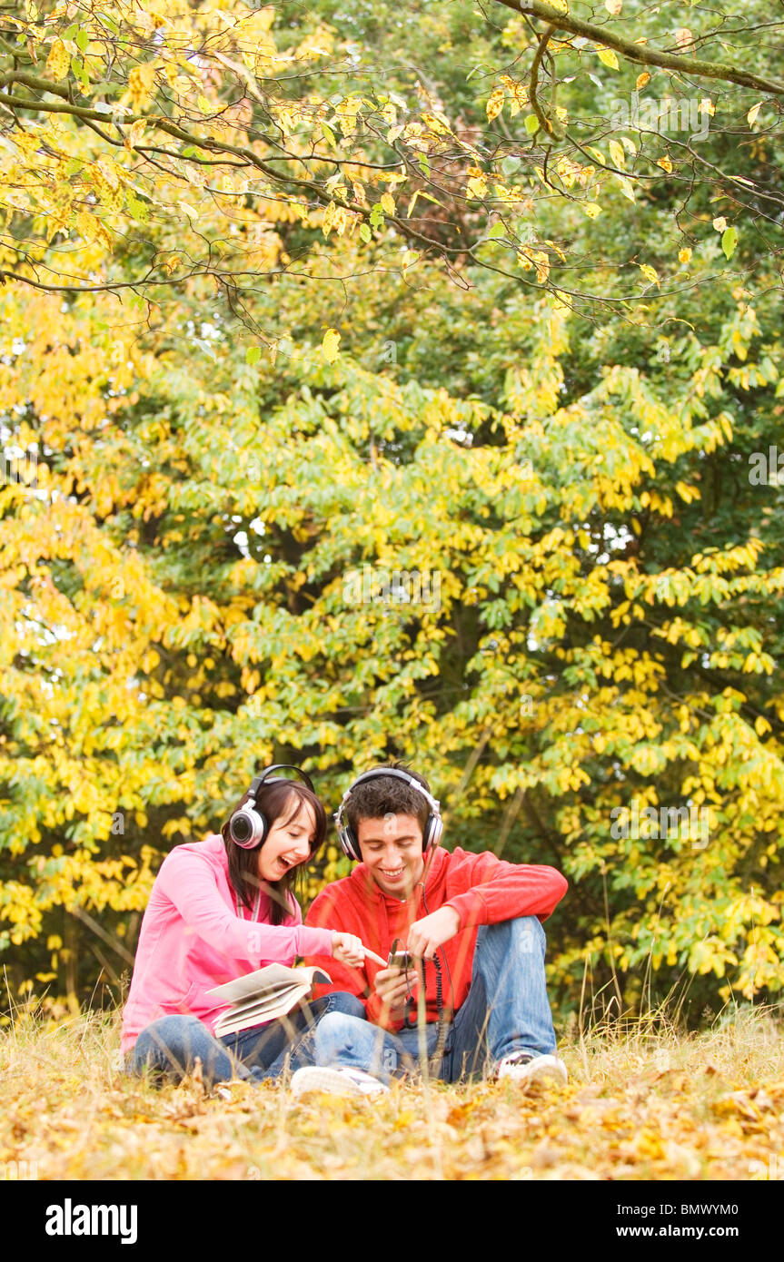 young couple sharing music Stock Photo