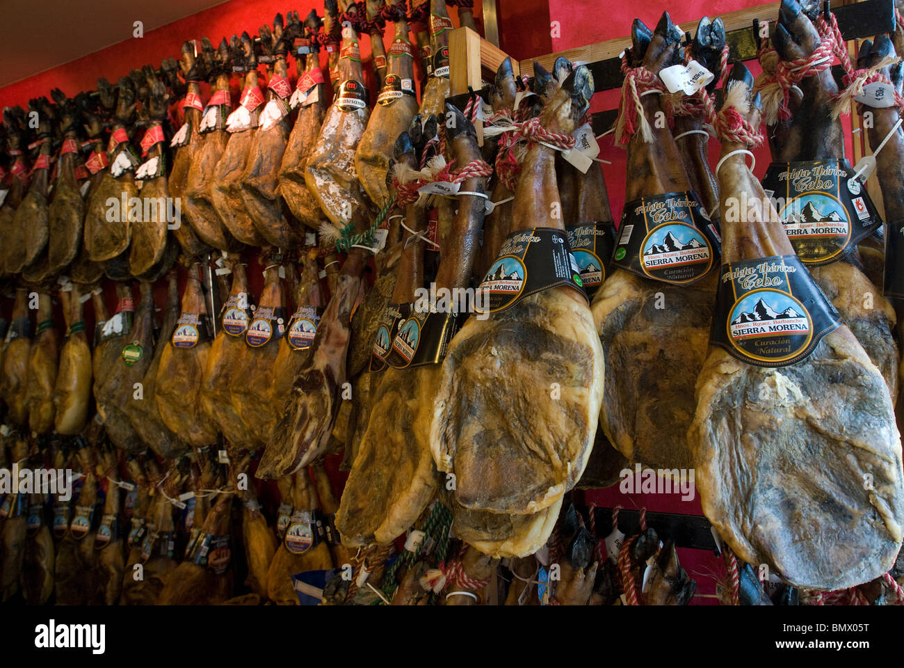 Cured Ham Jamon legs on display for sale, Mahon, Menorca, Balearics