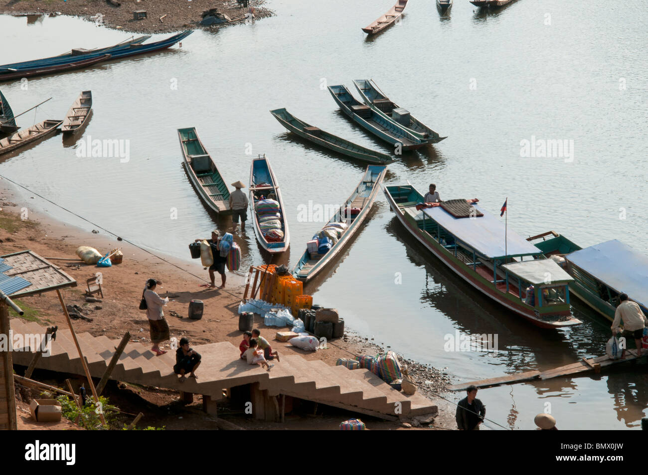 Goods being offloaded at Muang Ngoi in Northern Laos Stock Photo