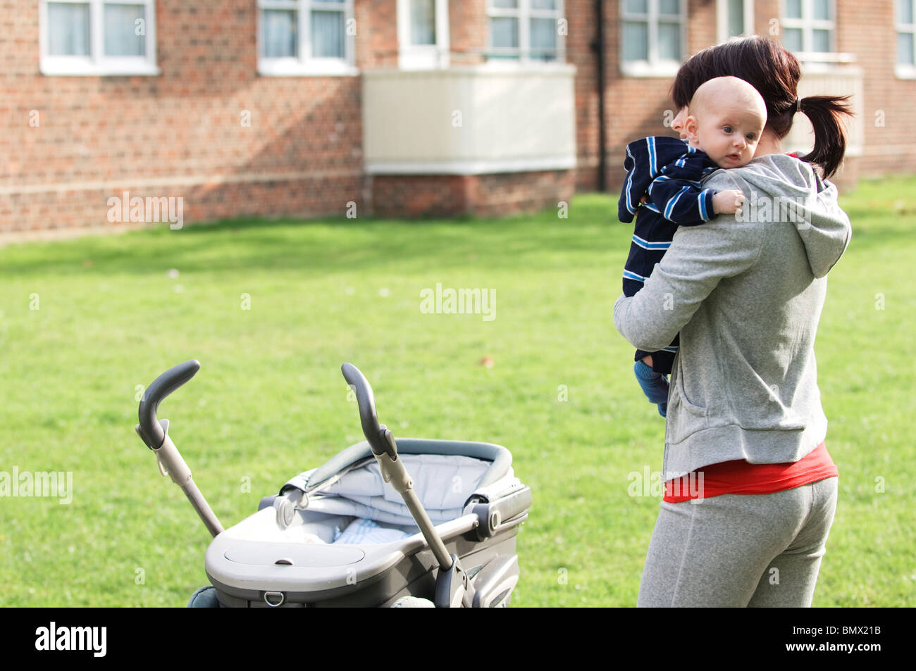 single mother with baby Stock Photo