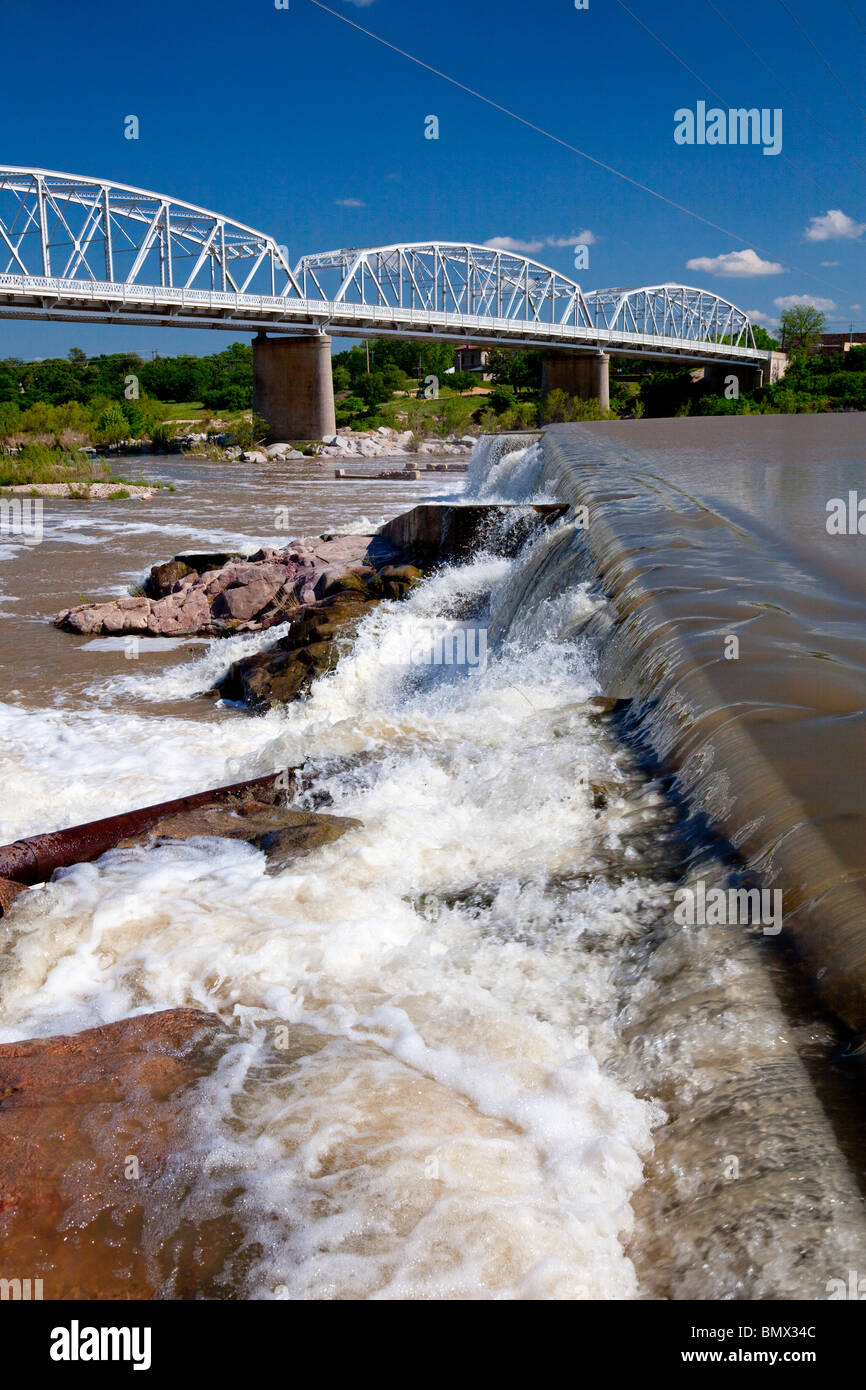 A bridge, dam and waterfall on the Llano river, Llano, Texas, USA Stock
