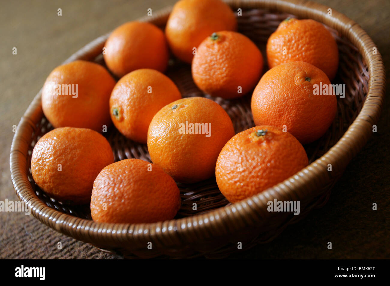 A basket of satsumas Stock Photo Alamy