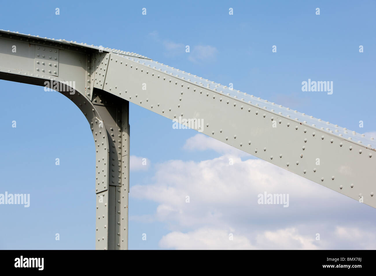 Riveted joints in the iron bridge support structure Stock Photo