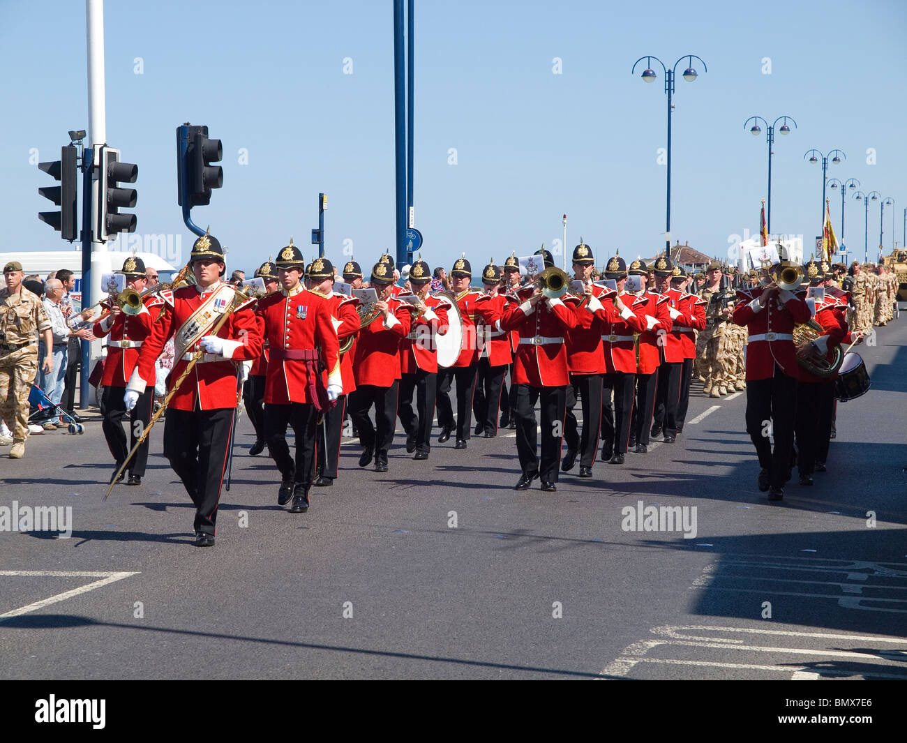 The Band of the King's Division lead the Yorkshire Regiment marching
