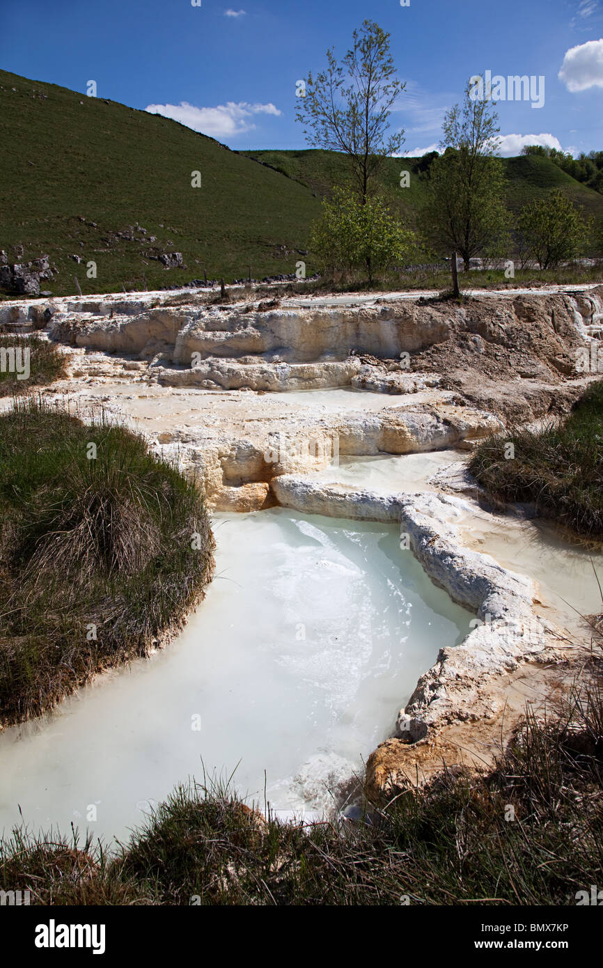 Tufa deposits in Brook Bottom Springs pollution Buxton Peak District Derbyshire UK Stock Photo