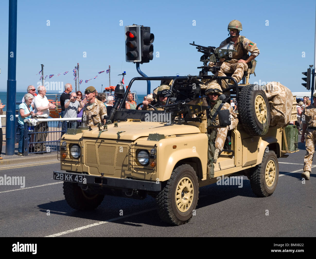 An armoured Land Rover parades with Yorkshire Regiment marching through ...