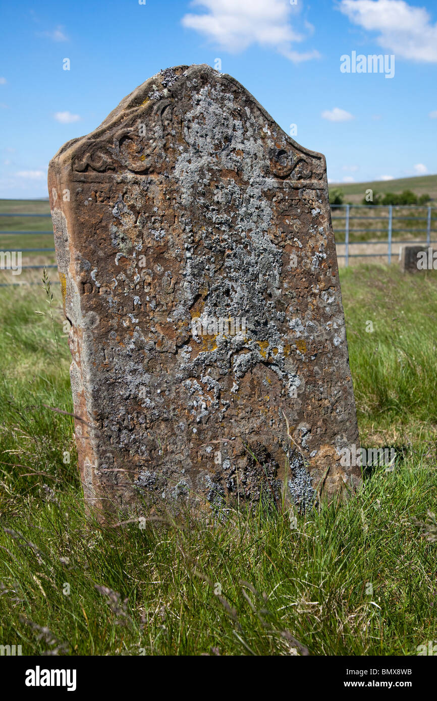 Lichen covered gravestone from the 1833 cholera epidemic Cefn Golau Cholera Cemetery Tredegar Wales UK Stock Photo