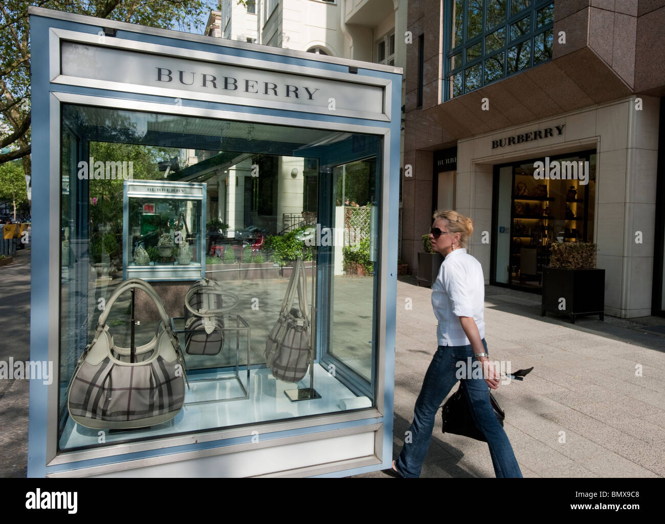 Luxury products on display in glass cabinets outside Burberry exclusive  shop on Kurfurstendamm in Charlottenburg Berlin Germany Stock Photo - Alamy