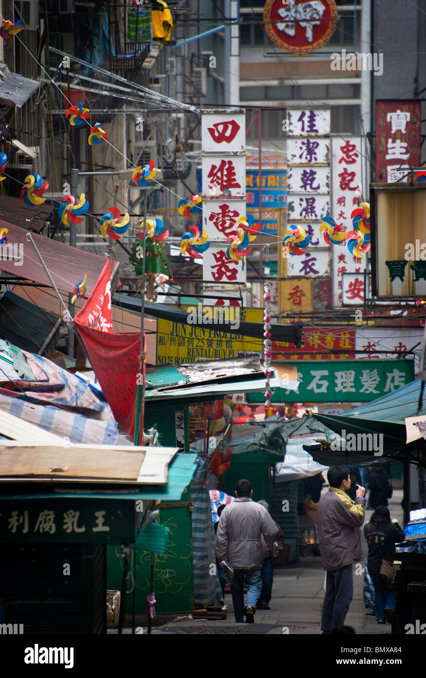 In the Hong Kong Central district there are many wet markets and shopping streets that typify the frenetic nature of the city. Stock Photo