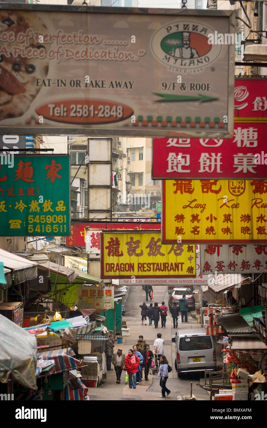 In the Hong Kong Central district there are many wet markets and shopping streets that typify the frenetic nature of the city. Stock Photo