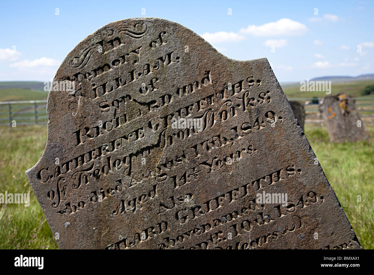 Gravestone from the 1849 cholera epidemic recording death of ironworks worker Cefn Golau Cholera Cemetery Tredegar Wales UK Stock Photo