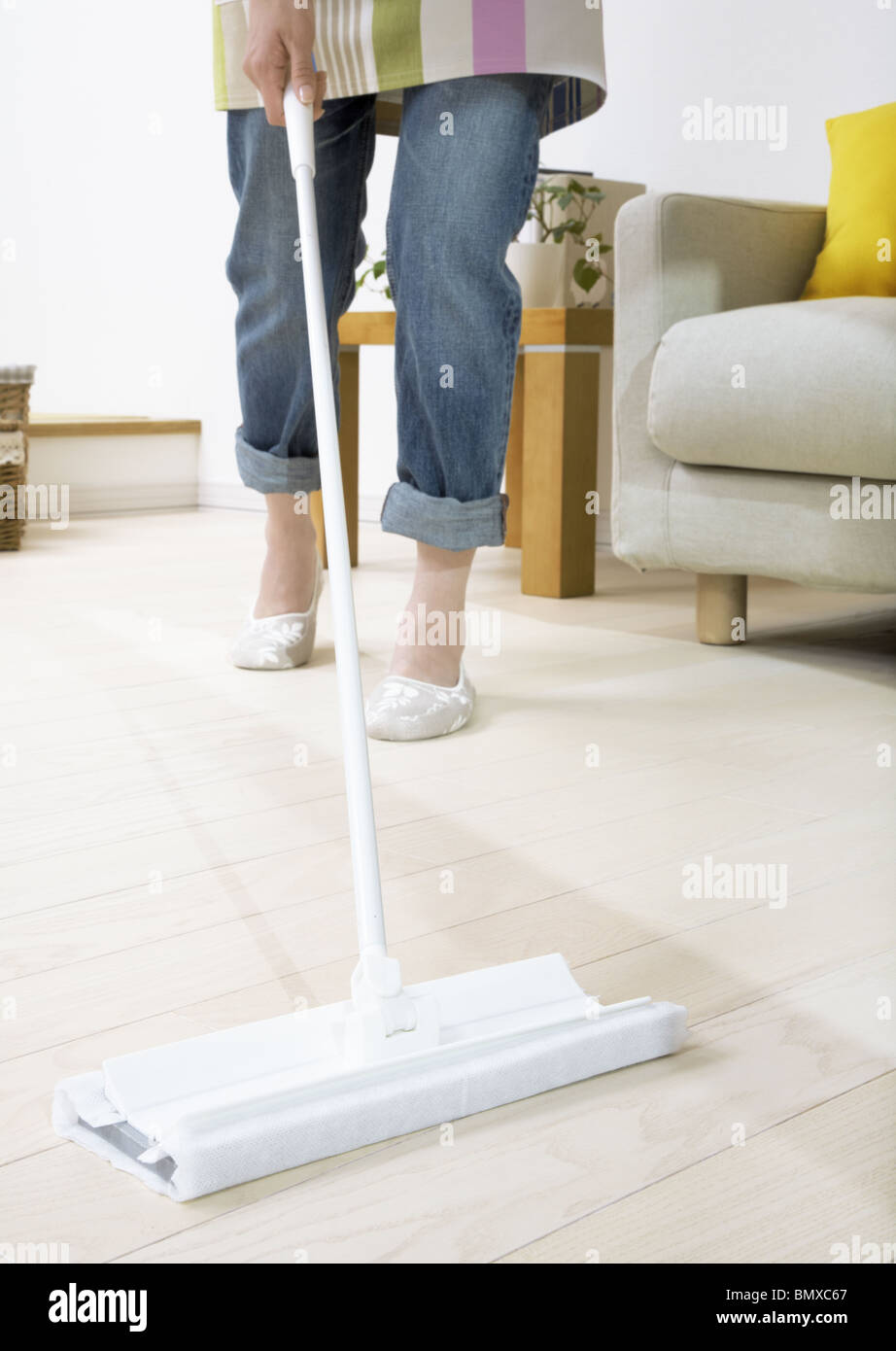Woman using cleaning wiper Stock Photo Alamy