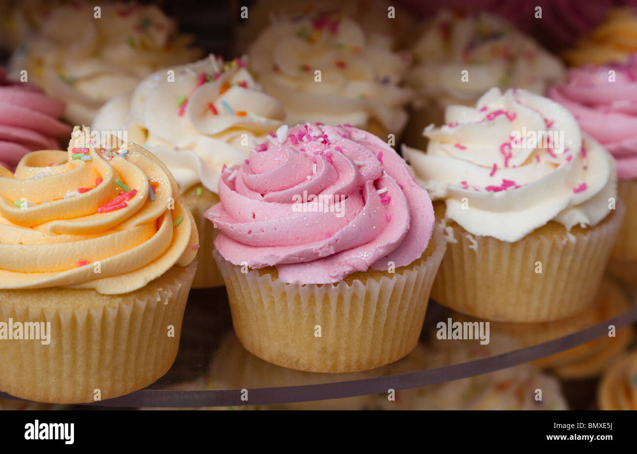 Stack Of Cup Cakes With Sugar Icing On Display Glasgow Scotland