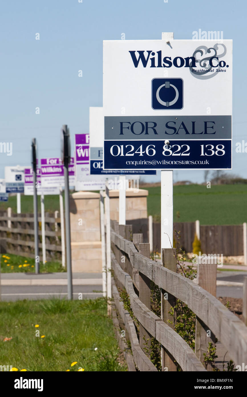 Property For Sale boards outside new houses in Nottinghamshire Stock