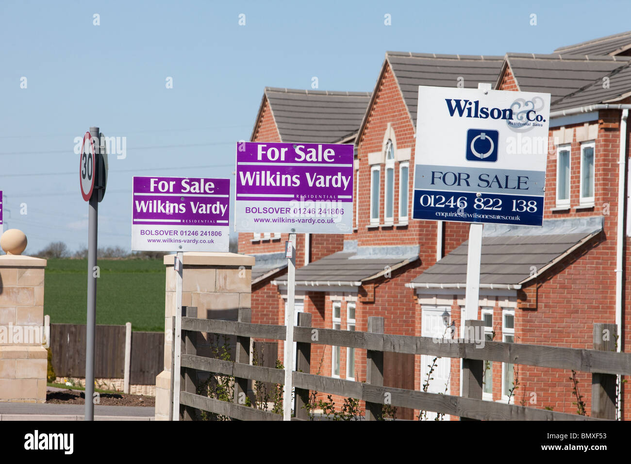 Property For Sale boards outside new houses in Nottinghamshire Stock