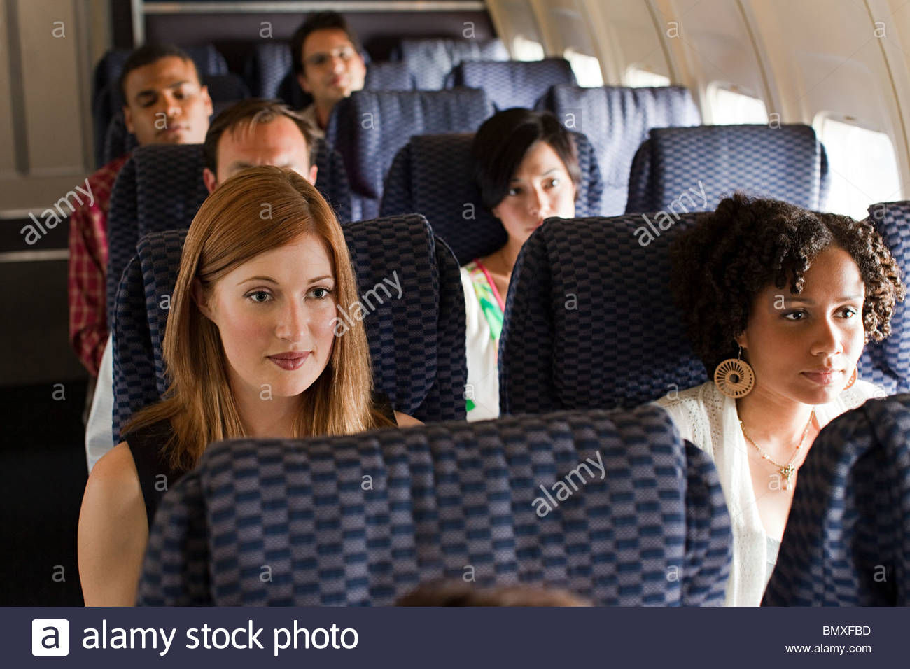 Airplane Passengers Stock Photos & Airplane Passengers Stock Images Alamy