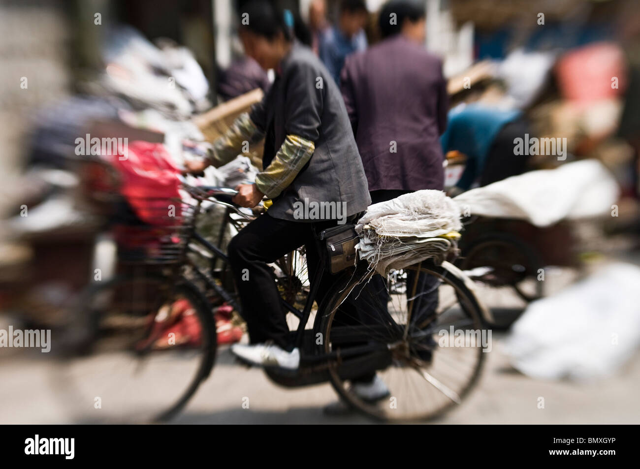 Cycle in motion in the streets of Nanjing Stock Photo Alamy