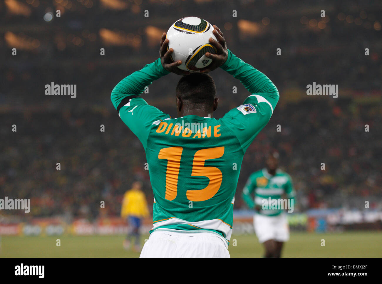 Aruna Dindane of Côte d'Ivoire sets for a throw in during a 2010 FIFA World Cup football match against Brazil June 20, 2010. Stock Photo